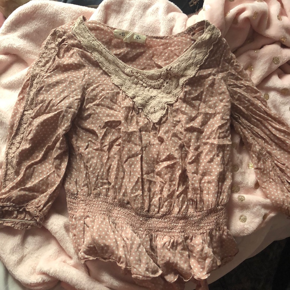 Pink and white polka dot blouse